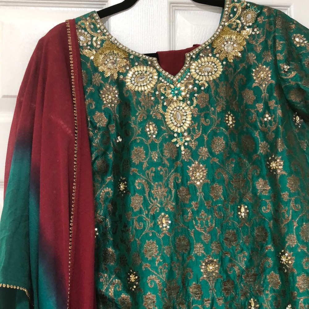 Green and maroon suit